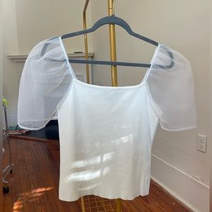 Knit white top with organza puff sleeves